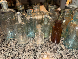 lot 175 image: Lot of Vintage French and English Glass Bottles - Boots Chemist & More
