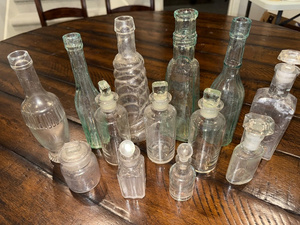 lot 177 image: Vintage Collection of 14 French and English Assorted Glass Bottles with Stoppers
