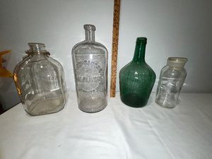 lot 250 image: Set of 4 Vintage Glass Bottles - Assorted Shapes & Colors