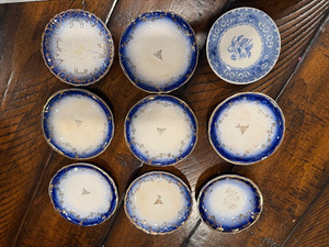 lot 89A image: Set of 9 Antique French Flow Blue Butter Pat Plates