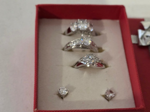 lot 12 image: Rhodium-Plated CZ Ring Set with Earrings