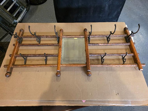 lot 43 image: Vintage Wooden Wall-Mounted Coat Rack with Mirror and Iron Hooks