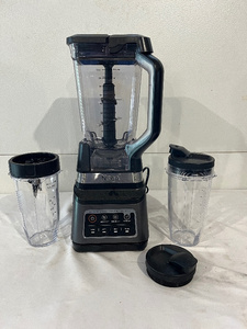 lot 106 image: Ninja Blender Set with 2 Personal Cups and Lids