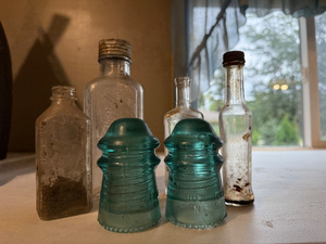 lot 131 image: Vintage Glass Bottles and Glass Insulators Lot