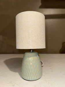 lot 148 image: Modern Ceramic Table Lamp with Textured Base and Fabric Shade