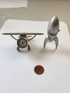 lot 184R image: Set of 2 Desk Clocks - Airplane and Rocket Ship Metal Miniatures