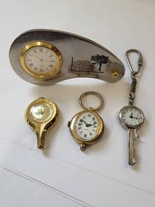 lot 192R image: Collection of 4 Vintage and Novelty Desk and Keychain Clocks