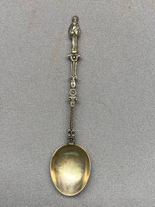 lot 25B image: Sterling Silver 835 Souvenir Spoon with Intricate Statue Design