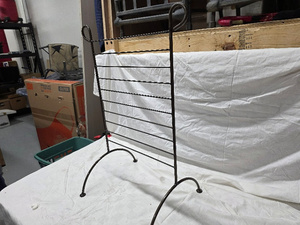 lot 8T image: Vintage-Style Metal Display Rack with Arched Legs
