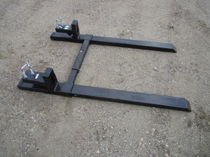 lot 29 image: Wolverine 48 Clamp on Pallet Forks wAdj. Stabilizer Arm