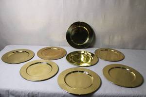lot 11 image: Set of 7 Brass Charger Plates Made in Hong Kong