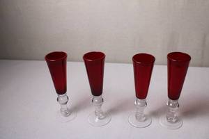 lot 17 image: Set of 4 Ruby Red Stemmed Glasses