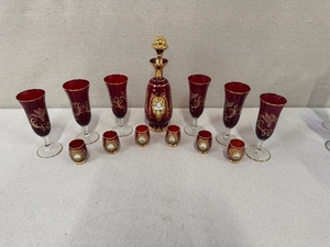 lot 32 image: Bohemian Ruby Red Decanter Set with 6 Stem Glasses and 6 Cordials