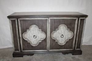 lot 56 image: Distressed Two-Door Wood Sideboard Cabinet with Shelves