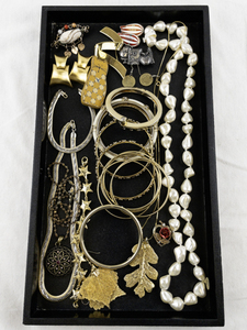 lot 65 image: Assorted Costume Jewelry Collection with Necklaces, Bangles, and Brooches
