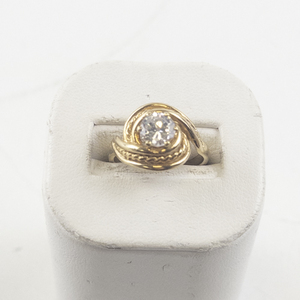 lot 88 image: Size 6 Gold Tone Base Metal Ring with CZ Stone