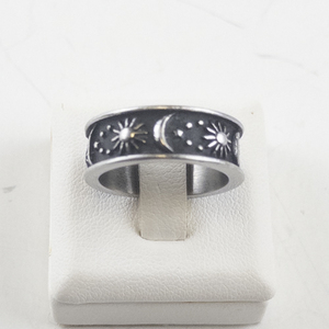 lot 91 image: Base Metal Ring Size 6.5 with Sun, Moon, and Star Design