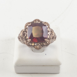 lot 100 image: Rose Tone Base Metal Ring with Lab-Grown Ruby, Size 7