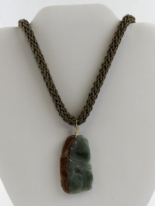 lot 176 image: Carved Jadite Jade Pendant Necklace with Woven Chain