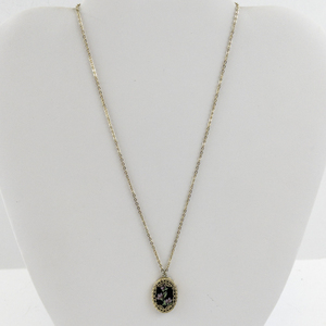 lot 196 image: Base Metal Necklace with Floral Oval Pendant