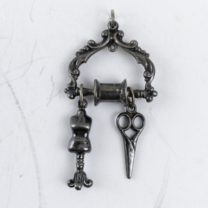 lot 134 image: Vintage Sewing Pendant with Scissors and Dress Form Charms