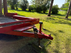 lot 2 image: Red Flatbed EquipmentVehicle Trailer with Ramp