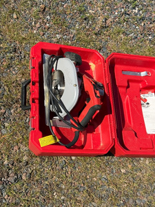 lot 12 image: Milwaukee Corded 7-14 Tilt-Lok Circular Saw with Case