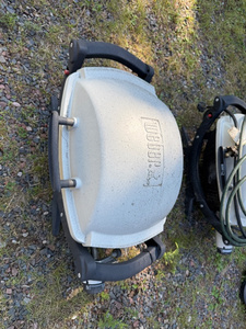 lot 21 image: Weber Portable Gas Grill with Hose
