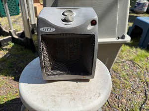 lot 57 image: Titan Space Heater with Thermostat and Mode Control