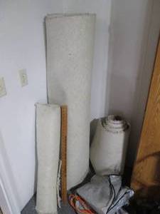 lot 73 image: Misc Carpet remnants, yardstick, bu...