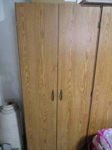 lot 75 image: Wood grain laminate 2-Door storage ...