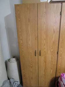 lot 77 image: Wood grain laminate 2-Door storage ...
