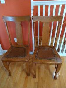 lot 45 image: (2) Antique Oak & Leather Chairs