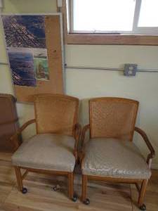 lot 103 image: (2) Wood Wide- Backed Rolling Chairs & Poster Board