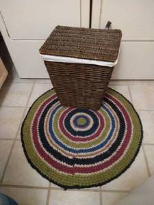 lot 131 image: Nice Laundry Hamper & Round Rug