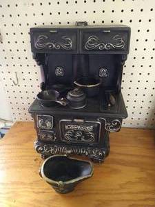 lot 192 image: Ceramic Wood Stove Model