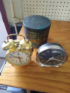 lot 195 image: (2) Wind-Up Clocks & Vintage Tin
