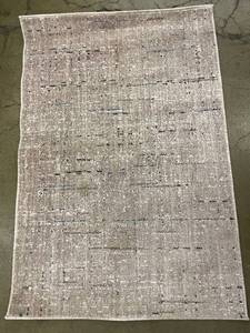 lot 55 image: Mohawk Home 44x30 Beige Textured Area Rug