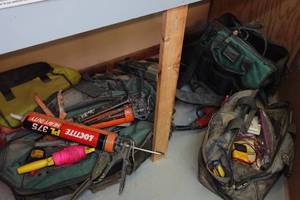 lot 84 image: Assorted Hardware - Caulk Guns, Tool Bag, Power Tools