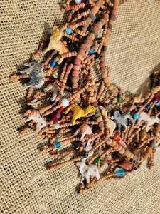 lot 126 image: Full and Fabulous Wood Bead Animal Necklace