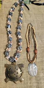lot 133 image: Shell and Turtle Pendant Necklace Pair