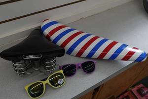 lot 555 image: 2 Bike Seats and Sunglasses