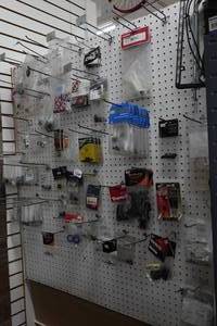 lot 827 image: Assorted Bike Parts - Bolts, Grommets, Pulleys, Derailleur Hangers