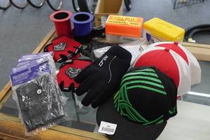 lot 965 image: Racing Gloves, Hats, Numbers and Can Coozies