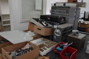 lot 943 image: Assorted Organizers and Small Bike Parts