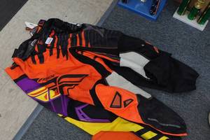 lot 707 image: 2 Pairs of BMX Racing Pants - Size 32