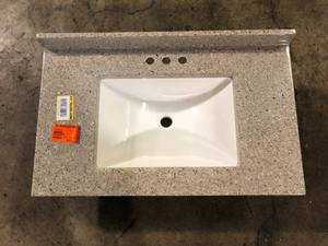 lot 20 image: Glacier Bay Delridge 31 in. Caramel Cultured Marble Top  Single Sink   Customer Returns See Pictures