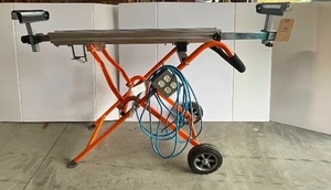 lot 41 image: Folding and adjustable work stand with power cord and plug