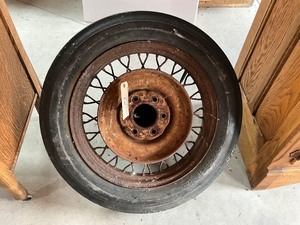 lot 68 image: Antique wire wheel & tire