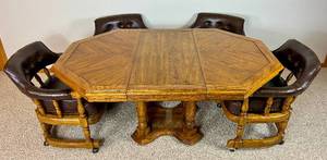 lot 34 image: Mid Century Octagonal Dining Table with Leaf and Four Vinyl Barrel Chairs on Wheels